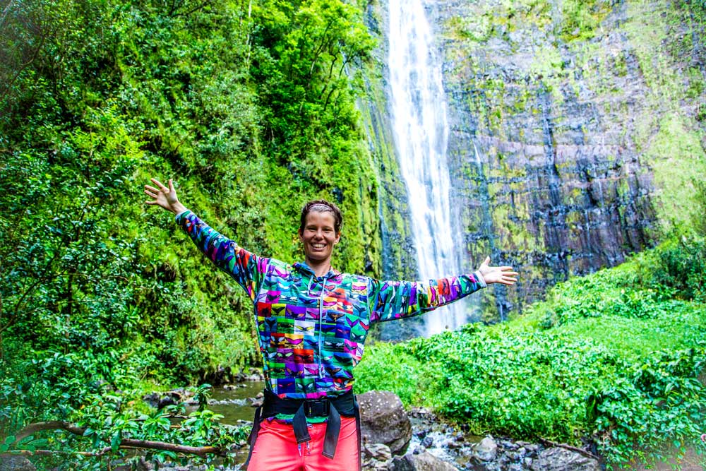 FLYING 'OKOLE Chelsea Kohl Hana Maui waterfall image on the About Design Solutions page.